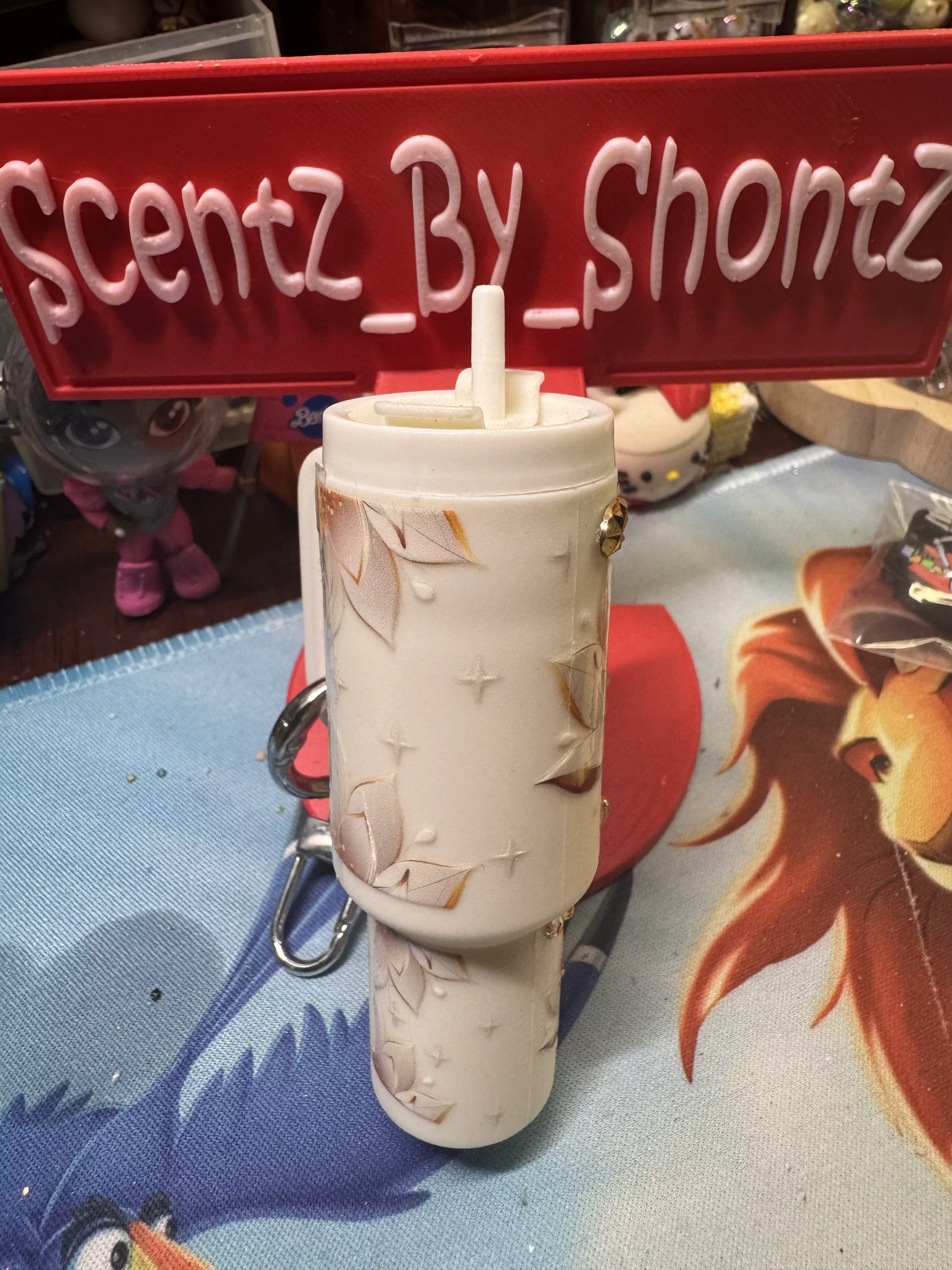 White mini tumbler with flower wrap. Rhinestones added by me